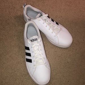 White Adidas Superstars